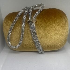 Gold velvet clutch